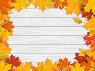 Wall Mural - White frame decorated of fallen maple leaves. Autumn foliage on the background of a wooden vintage table surface. Realistic vector illustration.