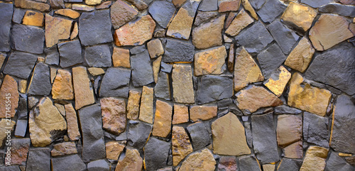 Fototapeta Dry old stone wall texture background close-up