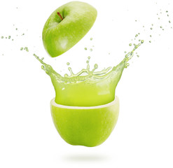 Wall Mural - fresh juice splashing out of a green apple isolated on white background