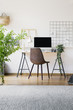 © Photographee.eu - Inspirational organizer in a hipster workspace interior with a stylish, leather chair by a tall, industrial desk with a desktop computer
