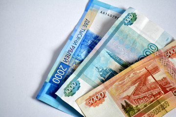 Russian ruble banknotes on white background