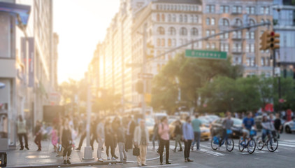 Wall Mural - Crowds of people crossing Broadway near Union Square Park in Manhattan New York City with blurred sunlight background