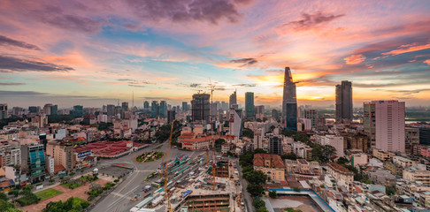 Wall Mural - Royalty high quality free stock image aerial view of Ho Chi Minh city, Vietnam. Beauty skyscrapers along river light smooth down urban development in Ho Chi Minh City, Vietnam.