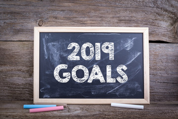 Wall Mural - 2019 goals business concept. Chalk board Background