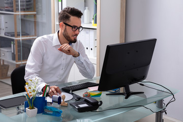 Businessman Working On Computer