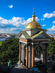 Tower of St. Isaac's Cathedral close-up, St. Petersburg, Russia. View of St. Petersburg from a height, cityscape.