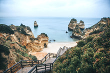 A Staircase Leading To The Beach Near The City Of Lagos In Portugal.