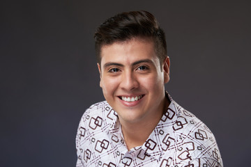 Wall Mural - Portrait of happy positive young man