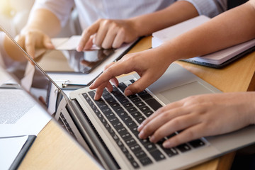 Co working conference, Business team meeting present, investor executive colleagues discussing new plan financial graph data on office table with laptop and tablet, Finance, accounting