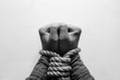 © itakdalee - bound hands. stop human trafficking