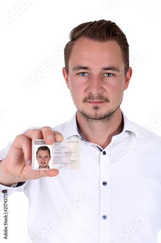 Mann Zeigt Seinen Personalausweis Mit Passfoto Stock Photo Adobe Stock
