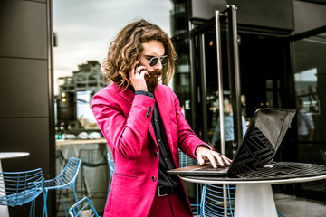 Hipster man working at computer