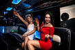 © oneinchpunch - Girls partying in a limousine