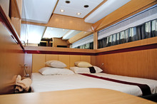 Brown And Gold Bedroom On Yacht