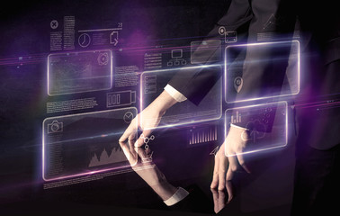 Poster - Male hands touching interactive table with purple cloudspace graphic on it 