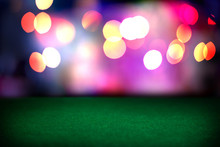 Empty Poker Table In Casino. Blurred Lights. Background For Your Design.
