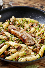 Wall Mural - Baked pork chop with penne pasta