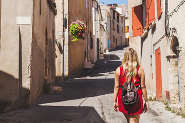 travel in Europe, tourist walking on the street  visiting small european town landmarks