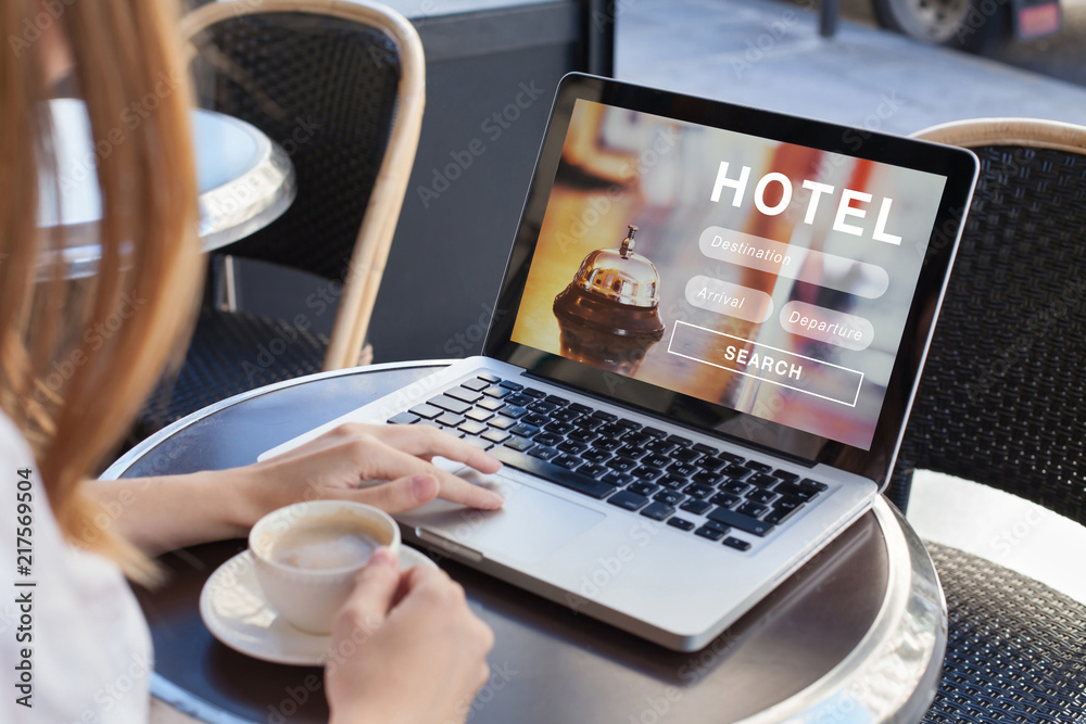 booking hotel on internet, travel planning, online reservation concept, woman looking at screen of computer searching  accommodation - obrazy, fototapety, plakaty 