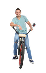 Sticker - Portrait of handsome man with bicycle on white background