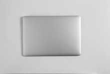 Modern Laptop On Light Background, Top View