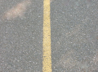 Yellow line on road.