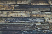 The Wooden Pattern And Textures Of The Rail Road Tie On The Side Of The Wall At The Farm.