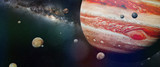 Fototapeta  - planet Jupiter with some of the 69 known moons with the Milky Way galaxy