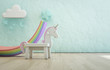 White toy unicorn on wooden floor of kids room with empty rough blue concrete texture wall background. Modern design interior 3d illustration.