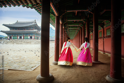 Korean lady in Hanbok or Korea gress and walk in an ancient palace Wallpaper Mural