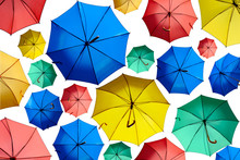 Colorful Umbrellas Isolated On A White Background.