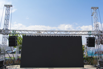 electronics and sound amplifiers on concert stage.