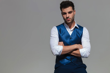 Poster - portrait of confident and elegant man wearing a blue waistcoast