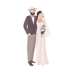 Wall Mural - Elegant bride dressed in fancy vintage gown and groom wearing stylish suit and hat