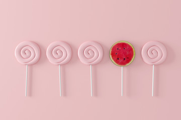 watermelon candy on pastel pink background. different concept. minimal fruit