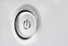 Power Button In White. Side View Of The Start Button. Selective Focus.