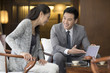 © Blue Jean Images - Confident businessman talking with a mature woman