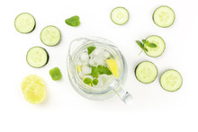 Cucumber, Lemon And Mint Lemonade In A Jar On A White Background With Copyspace