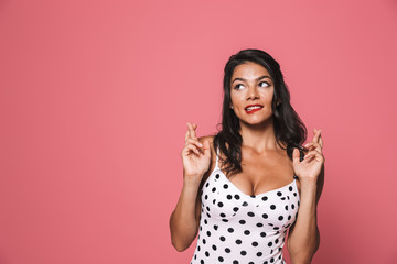 Poster - Beautiful woman in swimwear posing showing hopeful gesture.