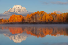 Scenic Reflection Landscape Of The Tetons In Autumn