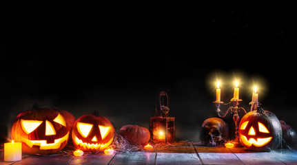 Scary horror background with halloween pumpkins jack o lantern