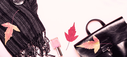 female fashion autumn accessories, shoes and handbag on pastel color background. Beauty and fashion concept