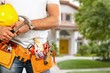 © BillionPhotos.com - Worker with a tool belt. Isolated over