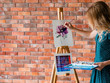 © golubovy - creative leisure. painting hobby. artful personality. talented girl drawing a picture of a flower in a workshop.