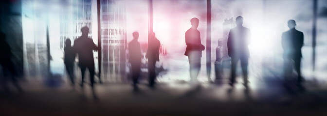 Wall Mural - Silhouettes of people walking in the street near skyscrapers and modern office buildings. Multiple exposure blurred image. Economy, finances, business concept illustration. Conseptual. 