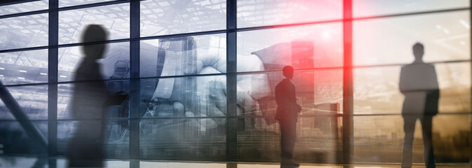 Wall Mural - Silhouettes of people walking in the street near skyscrapers and modern office buildings. Multiple exposure blurred image. Economy, finances, business concept illustration. Conseptual. 