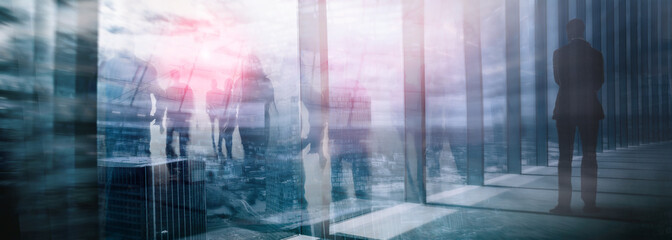 Wall Mural - Silhouettes of people walking in the street near skyscrapers and modern office buildings. Multiple exposure blurred image. Economy, finances, business concept illustration. Conseptual. 