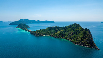 Wall Mural - Aerial drone view of a beautiful remote tropical island surrounded by coral reef (Mergui Archipelago, Myanmar)