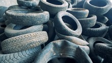 Lots Of Used Tires, Close Up. Old Tires Are Piled At A Dump. 4K.