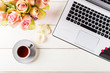 Feminine business mockup with laptop, roses bouquet and cup of c